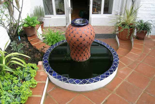 The pool is centred on the door out from the flat