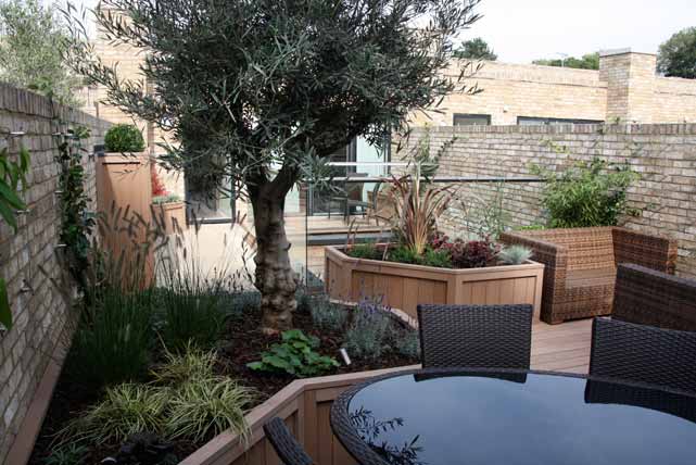 The largest planter wraps around the dining area